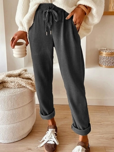 Women's charcoal grey vertical striped lounge pants with adjustable drawstring waist