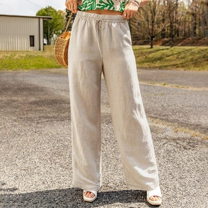Close-up of lightweight cotton linen wide leg trousers with elastic drawstring waist