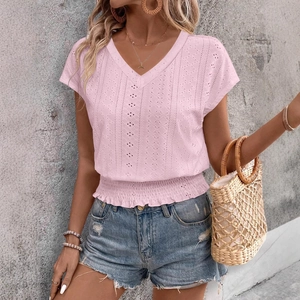 Women's V-neck pink short sleeve top with eyelet embroidery and smocked hem detail