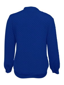 Detail view of navy blue quilted long sleeve jacket with diamond pattern and ribbed cuffs