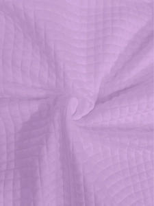 Close-up of purple waffle knit fabric texture showing soft cotton blend material detail