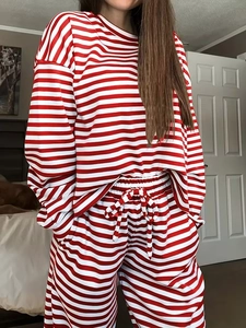 Close-up of red and white striped lounge set with white drawstring and elastic waist