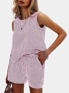 Detailed view of pink vertical stripe sleeveless top and matching drawstring shorts set