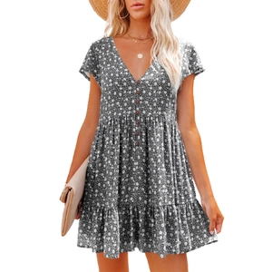 Detail of V-neck button closure and floral print on summer short sleeve dress