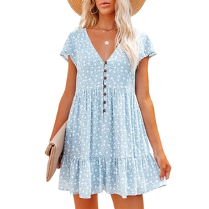 Detail of V-neck buttoned floral dress in light blue with tiered ruffled hemline