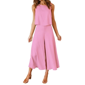 Detail of pink two-piece set featuring sleeveless round neck top and high-waist wide-leg pants