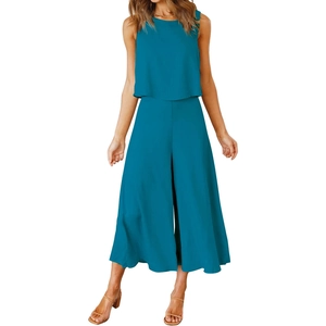 Detail of teal sleeveless crop top and high waist wide leg trousers two-piece set