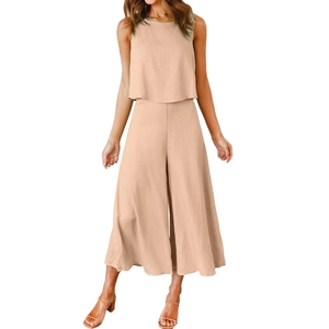 Close-up of beige cotton-linen fabric on sleeveless top and wide-leg crop pants
