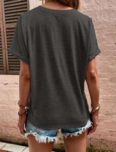 Detail view of charcoal grey t-shirt featuring rolled cuffs and a casual back view
