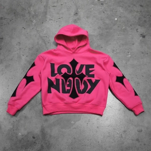 Pink oversized hoodie with LOVE NAVY text and black gothic cross prints on front and sleeves