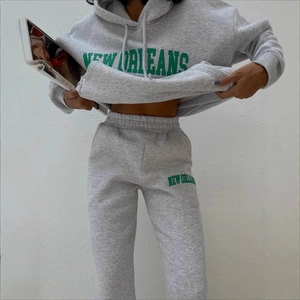 Graues Damen Fleece Hoodie und Jogginghosen Set mit grünem New Orleans Aufdruck