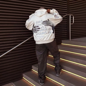 Oversized white hoodie with foam print heart arm and back typography for street style
