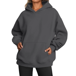 Front view of dark grey oversized hoodie with kangaroo pocket and ribbed cuffs