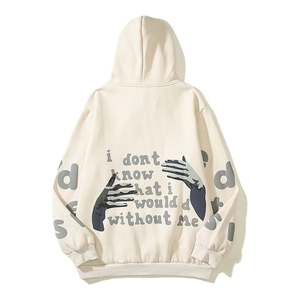 Close-up of artistic foam heart print and letter embroidery on off-white hoodie
