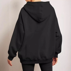 Oversized black hoodie for women featuring a minimalist dropped shoulder design from back view