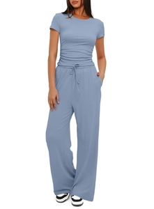 Detail of smog blue two-piece lounge set featuring ruched side tees and wide leg pants