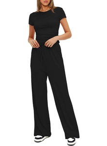 Detail of black short sleeve top and high waist wide leg lounge set with drawstring