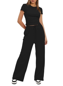 Detailed view of high-waist drawstring waistband on black wide-leg casual lounge pants