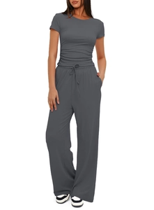Detail of charcoal grey ruched short sleeve top and high waist wide leg pants set