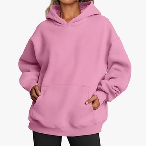 Women's oversized pink hoodie with kangaroo pocket and ribbed cuffs for casual wear