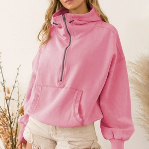 Pink half-zip hooded sweatshirt with drop shoulder and kangaroo pocket in casual style