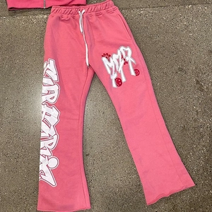 Rosa Y2K Schlaghose mit Streetstyle Graffiti Prints und elastischem Kordelzug am Bund