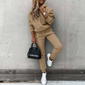 Detail of khaki two-piece hoodie and sweatpants set featuring thick cotton knit fabric