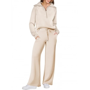 Completo due pezzi da donna con felpa beige con zip e pantaloni sportivi a gamba larga