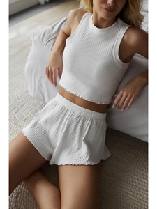 White ribbed knit two-piece lounge set with sleeveless round neck top and shorts