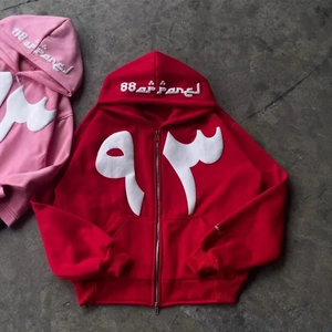 Y2K streetwear zip-up hoodie featuring oversized foam puff print in red and pink colors