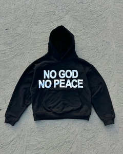 Detailed flat lay of black streetwear hoodie with NO GOD NO PEACE white letter print