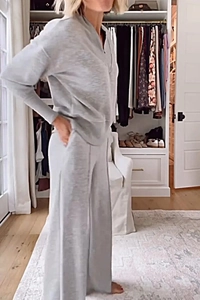 Detail view of the fine knitted texture and drape of the grey loungewear set