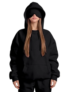 Detail view of hooded sweatshirt with integrated sleep mask and large kangaroo pocket