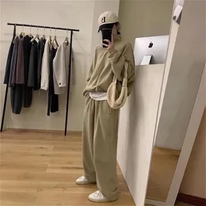 Women's chic beige lounge set with half-zip sweatshirt and wide-leg jogger pants