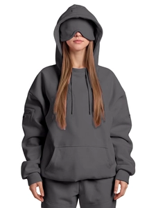 Detail view of dark grey hoodie featuring integrated sleep mask and oversized fit design