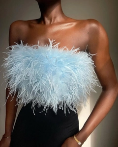 Detail view of light blue fluffy feather tube top showing soft texture and elegant design