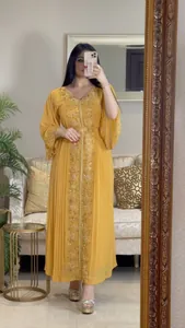 Elegant yellow long sleeve caftan dress with gold floral embroidery and pleated hem details