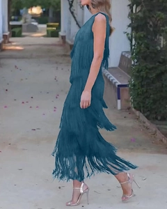 Detailed view of layered teal fringe on a sleeveless asymmetric party dress for women