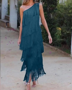 Detail of multi-layered blue fringe on an asymmetric one-shoulder evening dress