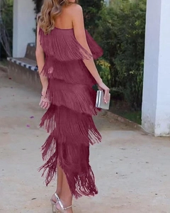Detailed view of layered deep red fringe on an asymmetric evening party dress