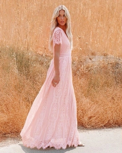 Detail of light pink lace maxi dress with deep V-neck and hollow waist ribbon design