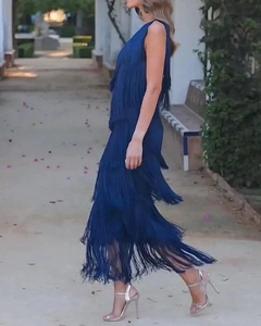Detailed view of dark blue fringe dress layers showing fluid movement and sleeveless cut