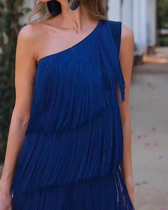 Detail of elegant dark blue one-shoulder dress with layered fringe and asymmetric design