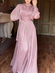 Elegant mauve pleated evening gown with rhinestone high neck and lantern sleeves