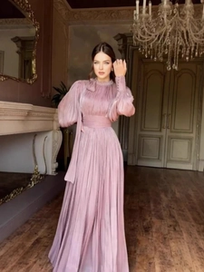Elegant mauve pleated long sleeve evening gown with high collar and wide waistband detailing