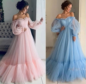 Detail of off-shoulder mesh gown with layered tulle skirt in pink and blue colors