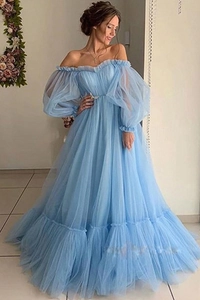 Detail of sky blue off-shoulder evening gown with layered tulle and oversized lantern sleeves