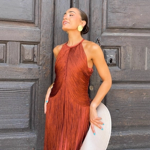 Orange halter neck tassel maxi dress with pleated texture for party and vacation wear