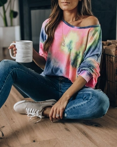 Women's colorful tie-dye waffle knit long sleeve lounge set in a cozy home setting