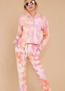 Detailed full-body view of tie-dye loungewear set with hoodie and joggers on model